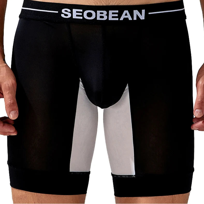 a sexy man in black SEOBEAN Men’s Dominion Long Sheer Boxer Briefs – pridevoyageshop.com – gay men’s sexy swim briefs, trunks, board shorts, and bikinis