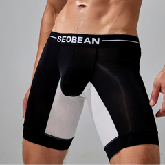 a sexy man in black SEOBEAN Men’s Dominion Long Sheer Boxer Briefs – pridevoyageshop.com – gay men’s sexy swim briefs, trunks, board shorts, and bikinis