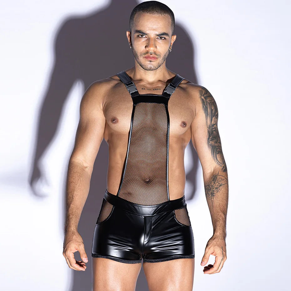 a sexy man in black The Peep Show Buckled Mesh Singlet – pridevoyageshop.com – gay men’s harness, lingerie and fetish wear