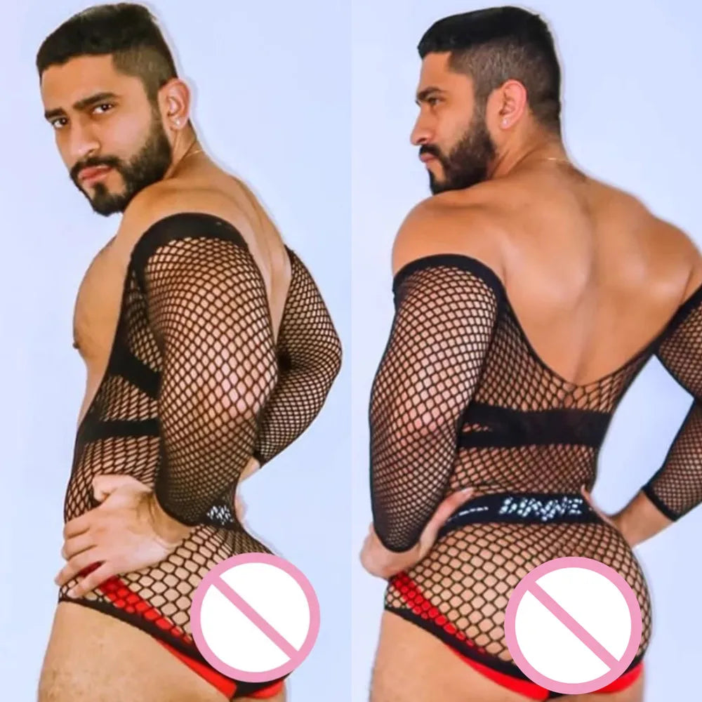 a sexy man in black cold-shoulder fishnet bodysuit, exposed shoulders, tight mesh fit hugging torso and hips – pridevoyageshop.com – gay men’s harness, lingerie and fetish wear
