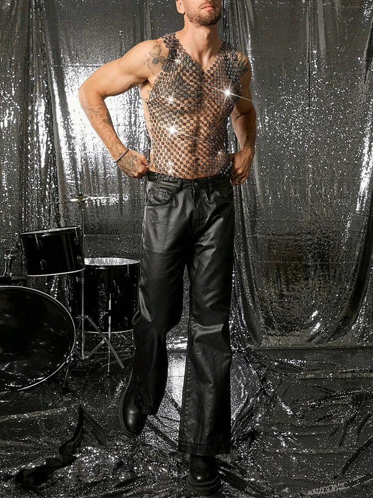 a sexy man in black crystal net tank showing toned torso and sparkle mesh detailing – pridevoyageshop.com – gay men’s harness, lingerie and fetish wear