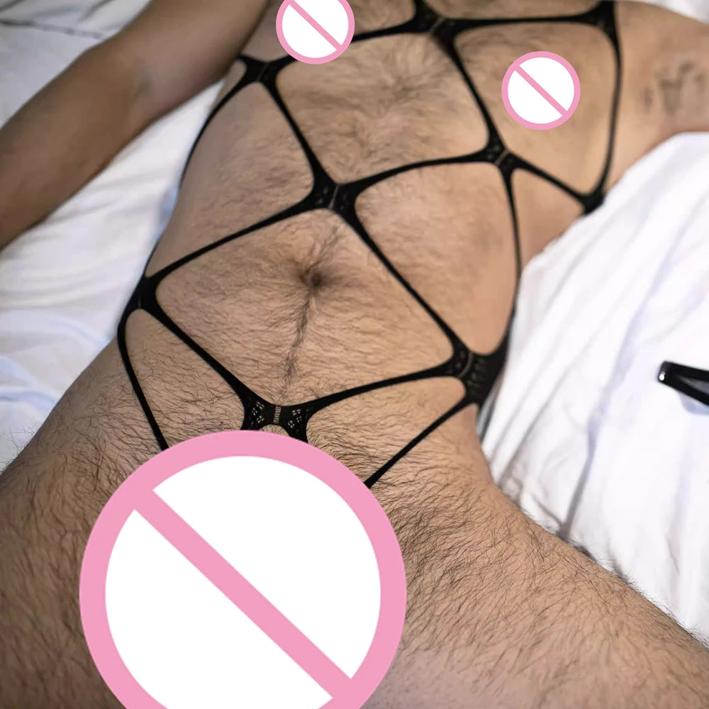 a sexy man in black strappy cut-out bodysuit with bold open front and high-leg fit – pridevoyageshop.com – gay men’s harness, lingerie and fetish wear