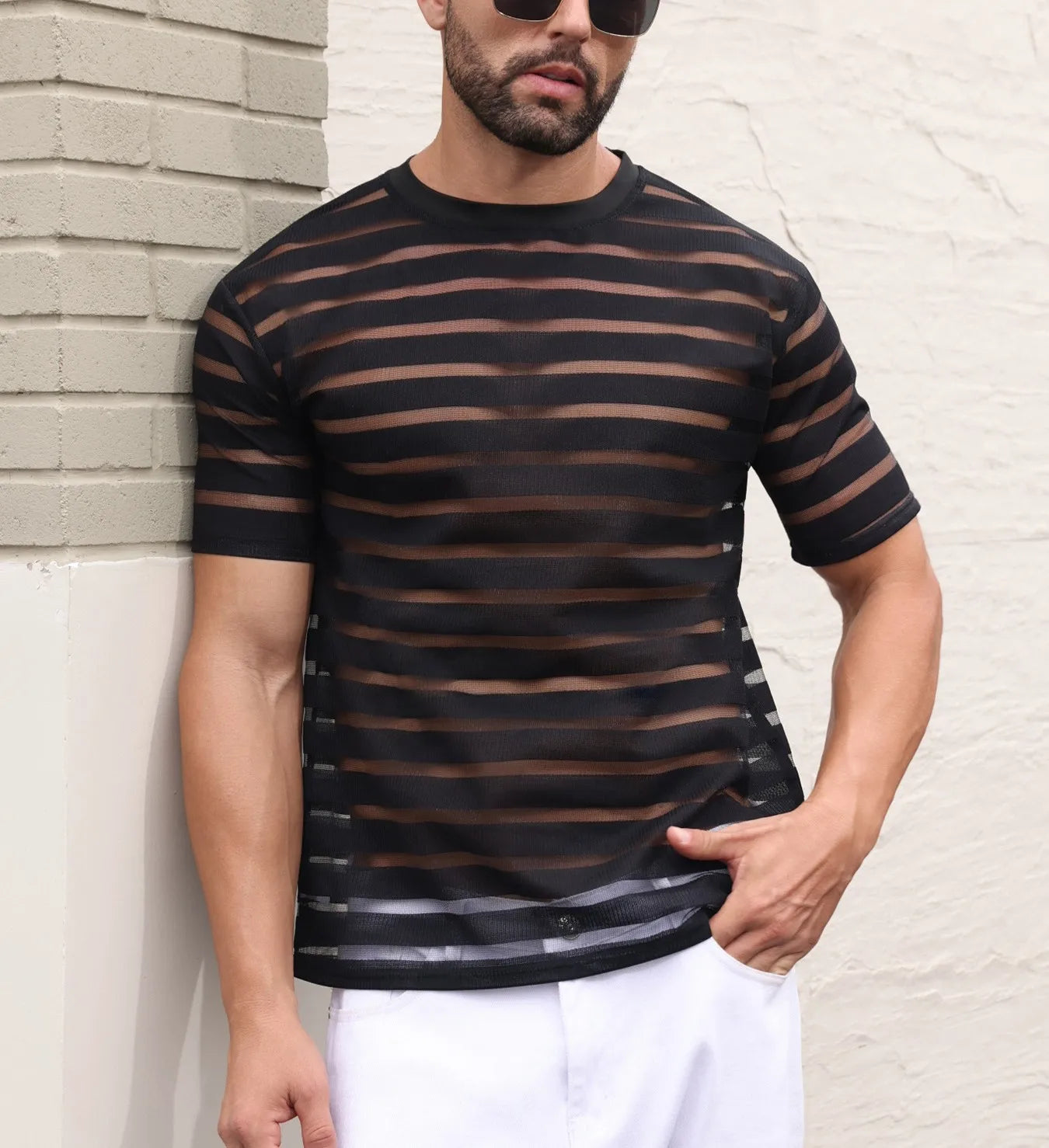 a sexy man in black striped The Venetian Sheer Stripe Tee - pridevoyageshop.com - gay men’s harness, lingerie and fetish wear