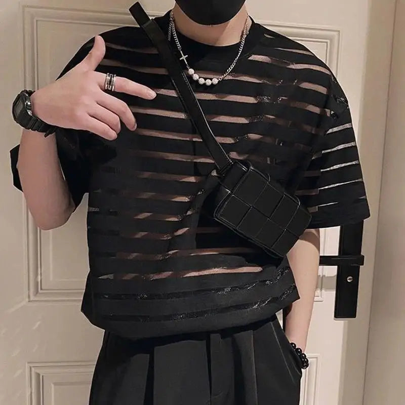 a sexy man in black striped The Venetian Sheer Stripe Tee - pridevoyageshop.com - gay men’s harness, lingerie and fetish wear