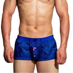 a sexy man in blue DM Men’s Airdrop Low-Rise Sheer Boxers – pridevoyageshop.com – gay men’s sexy swim briefs, trunks, board shorts, and bikinis