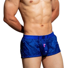 a sexy man in blue DM Men’s Airdrop Low-Rise Sheer Boxers – pridevoyageshop.com – gay men’s sexy swim briefs, trunks, board shorts, and bikinis