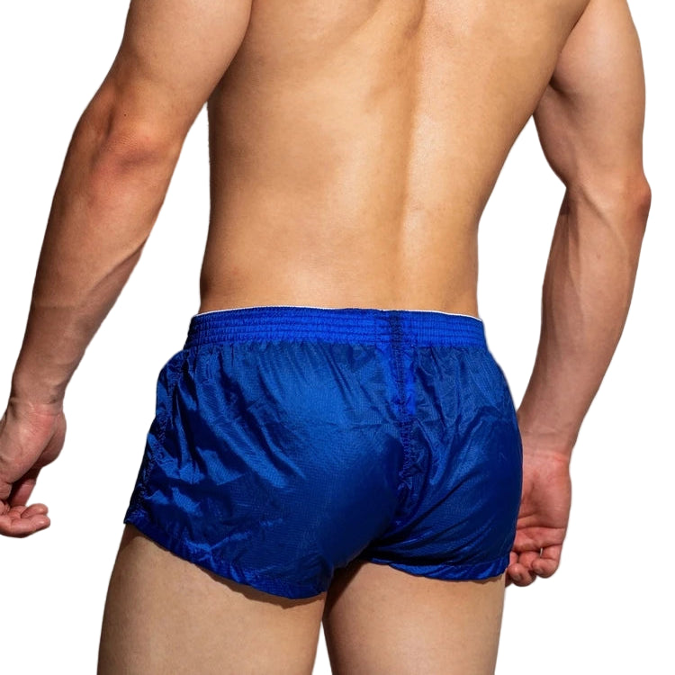 a sexy man in blue DM Men’s Airdrop Low-Rise Sheer Boxers – pridevoyageshop.com – gay men’s sexy swim briefs, trunks, board shorts, and bikinis
