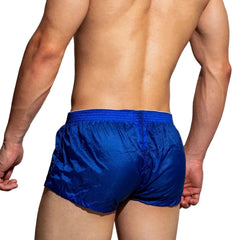 a sexy man in blue DM Men’s Airdrop Low-Rise Sheer Boxers – pridevoyageshop.com – gay men’s sexy swim briefs, trunks, board shorts, and bikinis