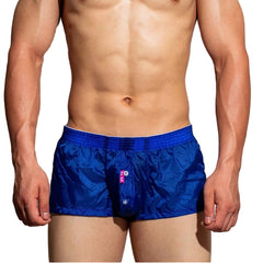 a sexy man in blue DM Men’s Airdrop Low-Rise Sheer Boxers – pridevoyageshop.com – gay men’s sexy swim briefs, trunks, board shorts, and bikinis