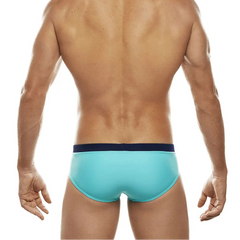 a sexy man in blue Men’s Clean Line Hookup Swim Briefs - pridevoyageshop.com - gay men’s sexy swim briefs, trunks, board shorts, and bikinis