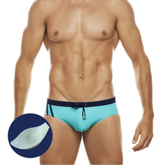a sexy man in blue Men’s Clean Line Hookup Swim Briefs with pad - pridevoyageshop.com - gay men’s sexy swim briefs, trunks, board shorts, and bikinis
