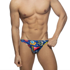 a sexy man in blue Men’s Comic Crotch Swim Briefs - pridevoyageshop.com - gay men’s sexy swim briefs, trunks, board shorts, and bikinis