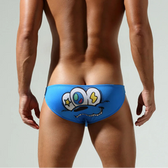 a sexy man in blue Men’s Crush Face Swim Briefs – pridevoyageshop.com – gay men’s sexy swim briefs, trunks, board shorts, and bikinis