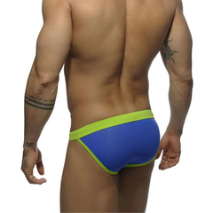 a sexy man in blue Men’s Forbidden Fruit Bikini Swim Briefs - pridevoyageshop.com - gay men’s sexy swim briefs, trunks, board shorts, and bikinis