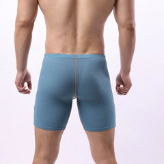 a sexy man in blue Men's Glory Big Pouch Waffle-Knit Long Boxers - pridevoyageshop.com - gay men’s thongs, boxers, briefs and jockstraps