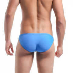 a sexy man in blue Men’s Power Split Swim Briefs - pridevoyageshop.com - gay men’s sexy swim briefs, trunks, board shorts, and bikinis