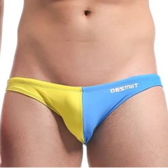 a sexy man in blue Men’s Power Split Swim Briefs - pridevoyageshop.com - gay men’s sexy swim briefs, trunks, board shorts, and bikinis