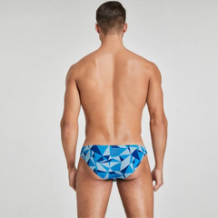 a sexy man in blue Men’s Prism Tease Swim Briefs - pridevoyageshop.com - gay men’s sexy swim briefs, trunks, board shorts, and bikinis