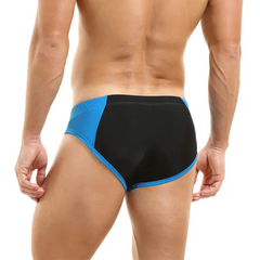 a sexy man in blue Men’s Zip Me Up, Boy Swim Briefs - pridevoyageshop.com - gay men’s sexy swim briefs, trunks, board shorts, and bikinis
