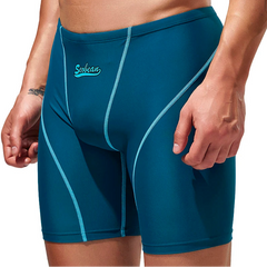a sexy man in blue green Men’s Code Lock Speed Vortex Compression Swim Shorts – pridevoyageshop.com – gay men’s sexy swim briefs, trunks, board shorts, and bikinis