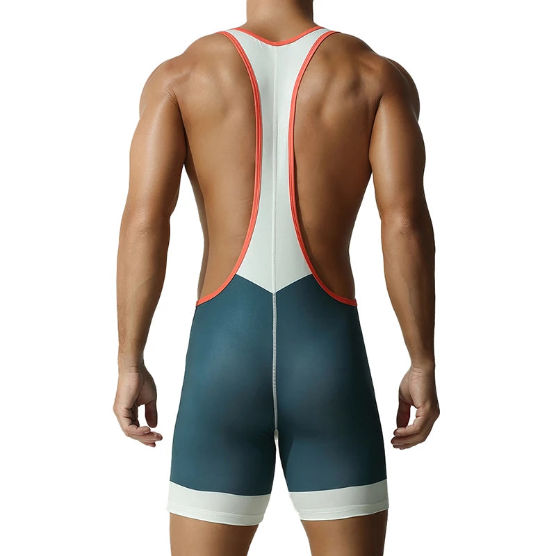 a sexy man in bluish green Men’s On-Point Chevron Singlet – pridevoyageshop.com – gay men’s harness, lingerie and fetish wear