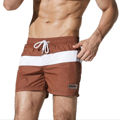 a sexy man in coffee Men’s Block Party Volley Swim Short – pridevoyageshop.com – gay men’s sexy swim briefs, trunks, board shorts, and bikinis