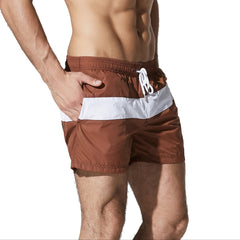 a sexy man in coffee Men’s Block Party Volley Swim Short – pridevoyageshop.com – gay men’s sexy swim briefs, trunks, board shorts, and bikinis