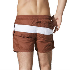 a sexy man in coffee Men’s Block Party Volley Swim Short – pridevoyageshop.com – gay men’s sexy swim briefs, trunks, board shorts, and bikinis
