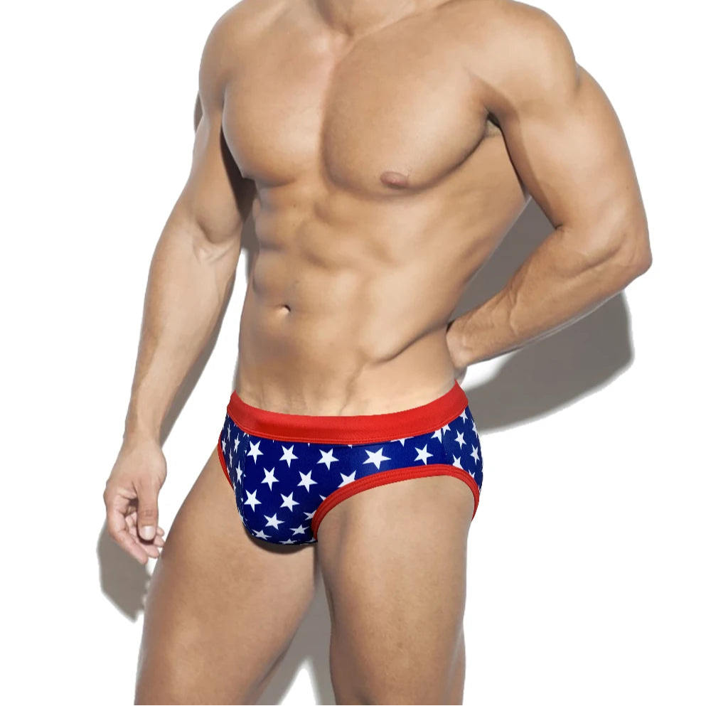 a sexy man in dark blue Men's All-American Swim Briefs - pridevoyageshop.com - gay men’s thongs, boxers, briefs and jockstraps