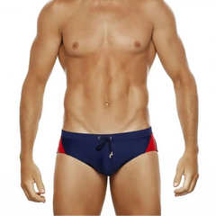 a sexy man in dark blue Men’s Backdoor Varsity Swim Briefs - pridevoyageshop.com - gay men’s sexy swim briefs, trunks, board shorts, and bikinis