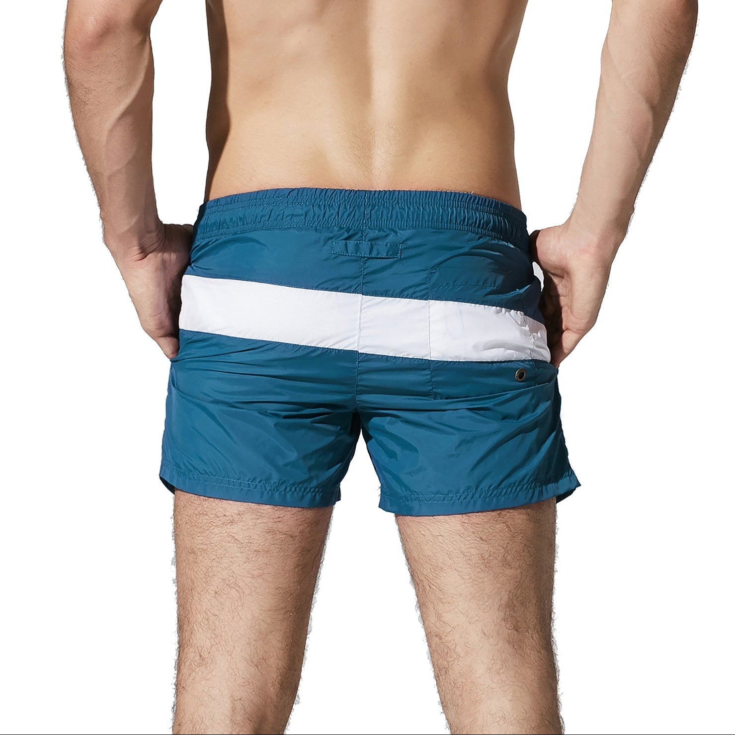 a sexy man in dark blue Men’s Block Party Volley Swim Short – pridevoyageshop.com – gay men’s sexy swim briefs, trunks, board shorts, and bikinis