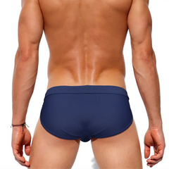 a sexy man in dark blue Men’s Clean Slate Swim Briefs - pridevoyageshop.com - gay men’s sexy swim briefs, trunks, board shorts, and bikinis