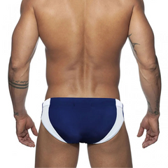 a sexy man in dark blue Men’s Daddy Discipline Swim Briefs - pridevoyageshop.com - gay men’s sexy swim briefs, trunks, board shorts, and bikinis