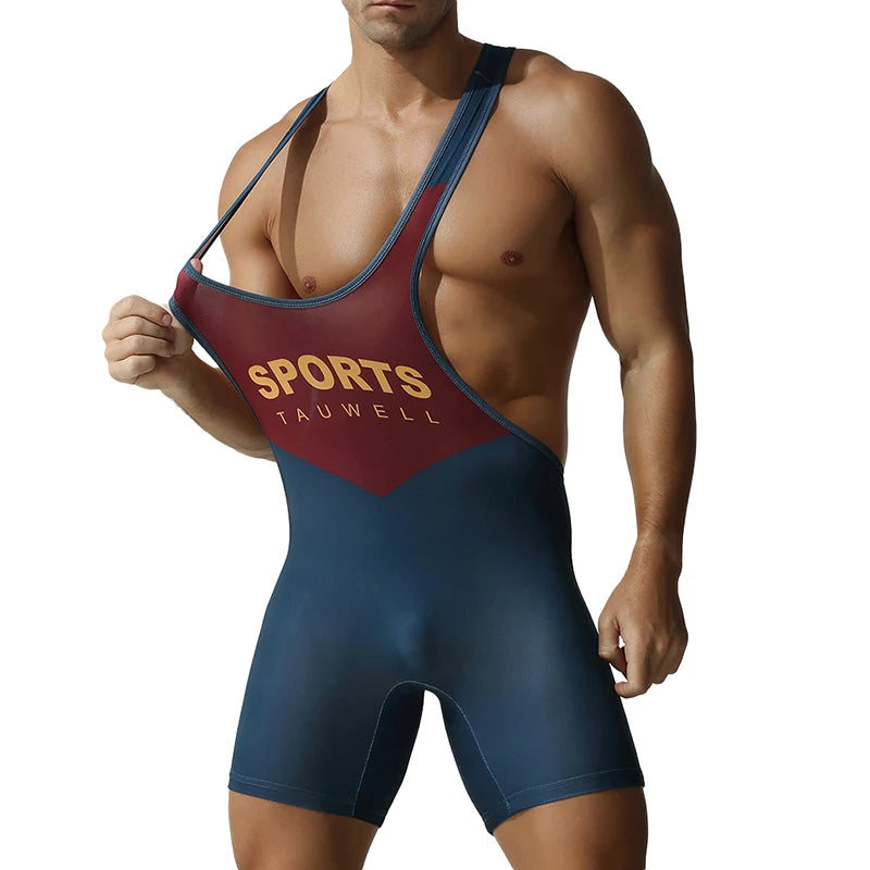 a sexy man in dark blue Men’s First-String Shield Singlet – pridevoyageshop.com – gay men’s harness, lingerie and fetish wear