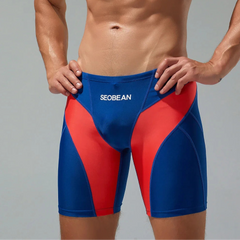 a sexy man in dark blue Men’s Iron Vortex Compression Swim Shorts – pridevoyageshop.com – gay men’s sexy swim briefs, trunks, board shorts, and bikinis