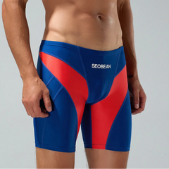 a sexy man in dark blue Men’s Iron Vortex Compression Swim Shorts – pridevoyageshop.com – gay men’s sexy swim briefs, trunks, board shorts, and bikinis