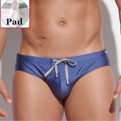 a sexy man in dark blue Men’s Poolside Power Bottom Swim Briefs with pad - pridevoyageshop.com - gay men’s sexy swim briefs, trunks, board shorts, and bikinis