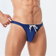 a sexy man in dark blue Men’s Show Pony Drawstring Swim Briefs - pridevoyageshop.com - gay men’s sexy swim briefs, trunks, board shorts, and bikinis
