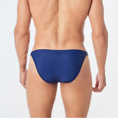 a sexy man in dark blue Men’s Show Pony Drawstring Swim Briefs - pridevoyageshop.com - gay men’s sexy swim briefs, trunks, board shorts, and bikinis