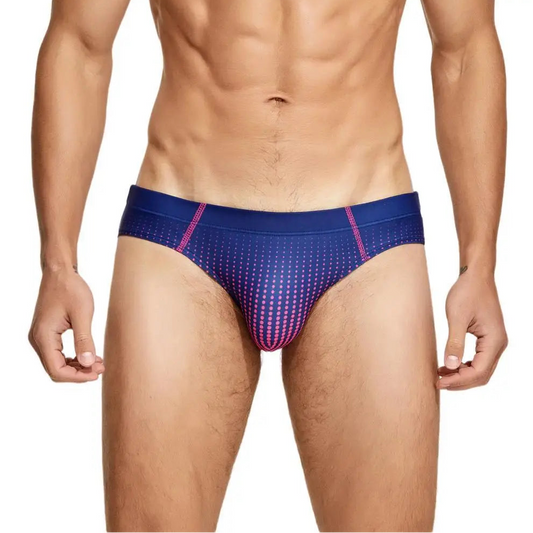 a sexy man in dark blue Men’s Spank Me Dotty Swim Briefs - pridevoyageshop.com - gay men’s sexy swim briefs, trunks, board shorts, and bikinis