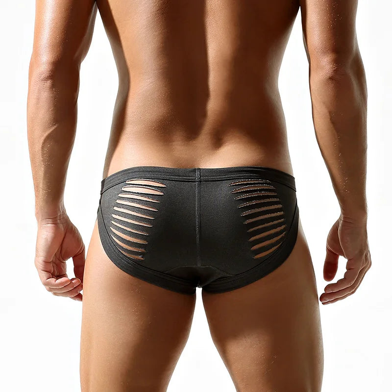 a sexy man in dark gray DM Men’s “Rip Me” Slashed Booty Briefs - pridevoyageshop.com - gay men’s thongs, boxers, briefs and jockstraps