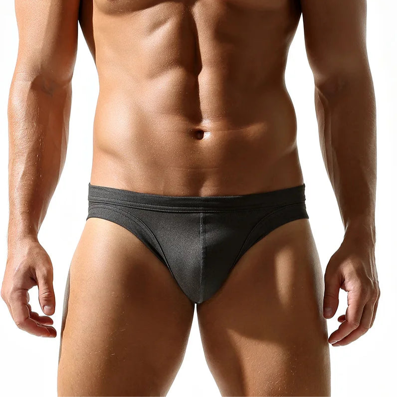 a sexy man in dark gray DM Men’s “Rip Me” Slashed Booty Briefs - pridevoyageshop.com - gay men’s thongs, boxers, briefs and jockstraps
