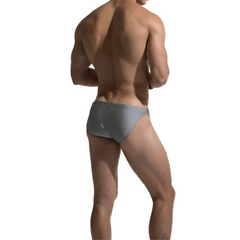 a sexy man in gray Desmiit Men’s After Hours Aquatics Briefs - pridevoyageshop.com - gay men’s sexy swim briefs, trunks, board shorts, and bikinis