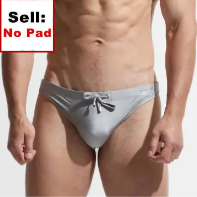 a sexy man in gray Desmiit Men’s After Hours Aquatics Briefs - pridevoyageshop.com - gay men’s sexy swim briefs, trunks, board shorts, and bikinis