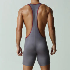 a sexy man in gray Men’s Championship Chest-Band Singlet – pridevoyageshop.com – gay men’s harness, lingerie and fetish wear