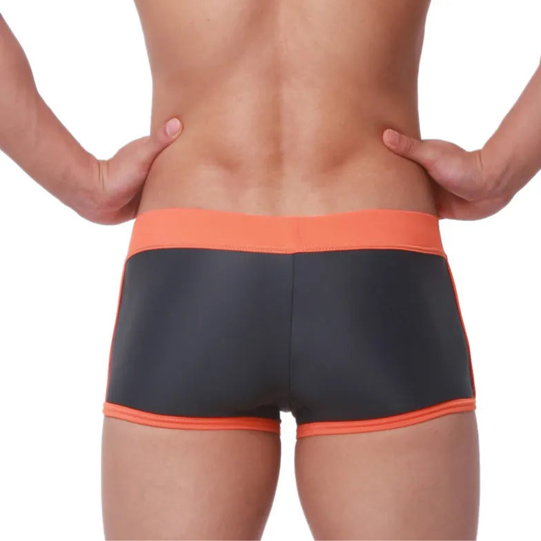 a sexy man in gray Men’s Circuit Beat Low Rise Swim Trunks - pridevoyageshop.com - gay men’s sexy swim briefs, trunks, board shorts, and bikinis