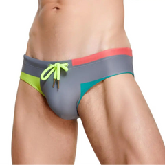 a sexy man in gray Men’s Colorblock Bait Swim Briefs - pridevoyageshop.com - gay men’s sexy swim briefs, trunks, board shorts, and bikinis
