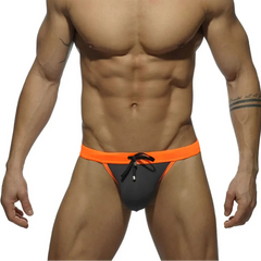 a sexy man in gray Men’s Forbidden Fruit Bikini Swim Briefs - pridevoyageshop.com - gay men’s sexy swim briefs, trunks, board shorts, and bikinis