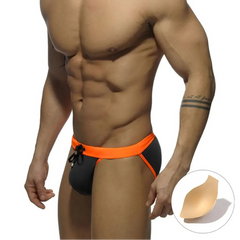 a sexy man in gray Men’s Forbidden Fruit Bikini Swim Briefs with pad - pridevoyageshop.com - gay men’s sexy swim briefs, trunks, board shorts, and bikinis