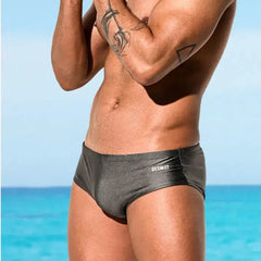 a sexy man in gray Men’s Pouch Devil Low Rise Swim Briefs - pridevoyageshop.com - gay men’s sexy swim briefs, trunks, board shorts, and bikinis